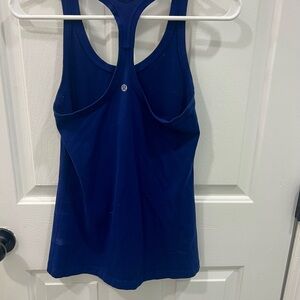Lululemon Cool Racerback II
Midnight blue  Size 8 Hip length